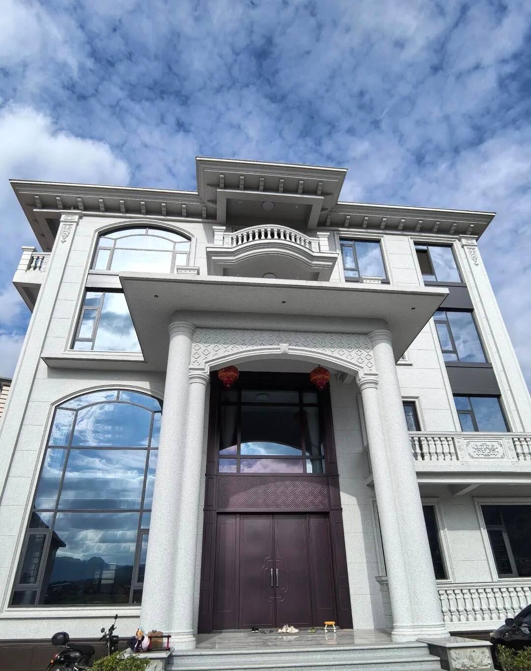 开封白麻别墅外墙干挂石材效果示例