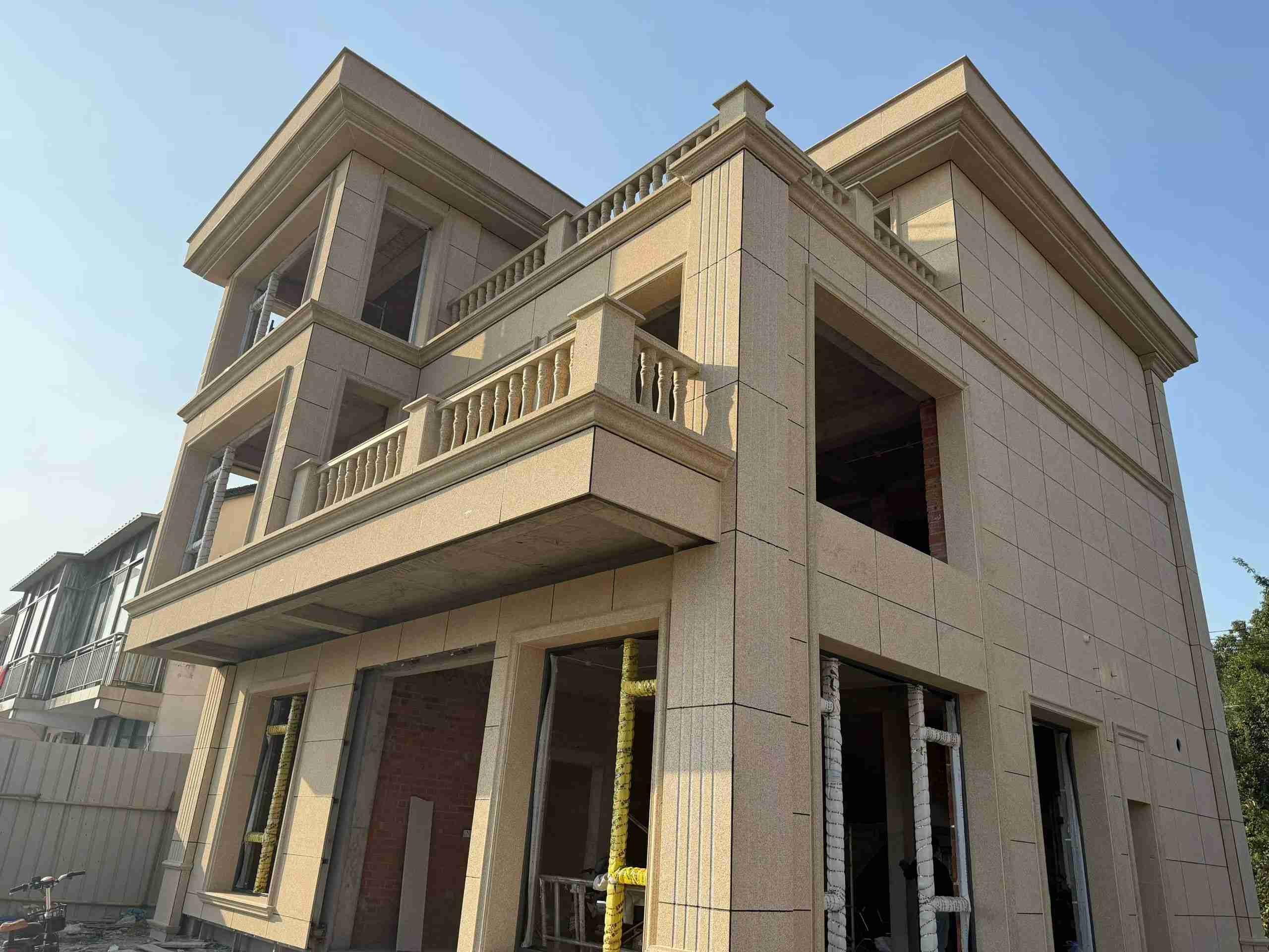 开封 黄金麻花岗岩石材荔枝面外墙干挂效果展示